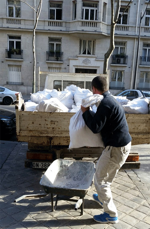 Debarrasser gravats avec camion-benne - Paris